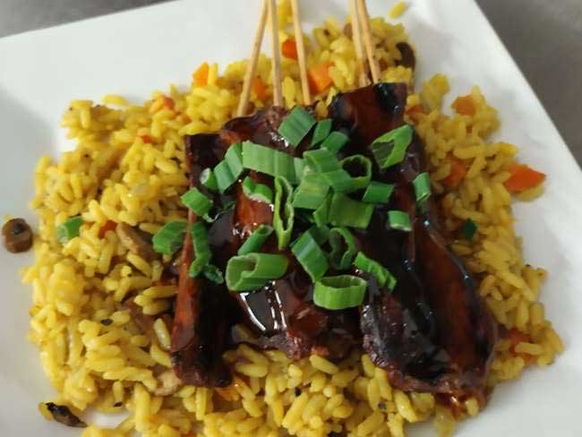 Marinated beef tips served over rice at Cheers Grille & Bar in Concord NH.