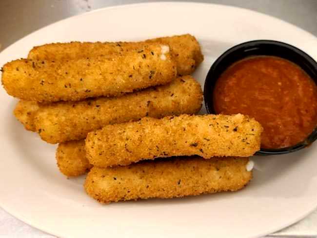 Hot and delicious mozzarella sticks served with marinara sauce at Cheers Grille & Bar in Concord NH.