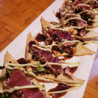Seared ahi tuna on wontons served at Cheer's Grille & Bar in Concord NH.