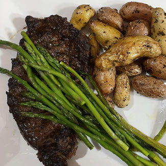Satisfy your craving for steak and potatoes at Cheers in Concord! Served how you like it with asparagus on the side.