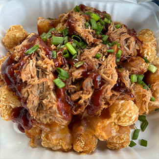 Smothered tots appetizer from Cheers Bar & Grill, the best appetizers in Concord, New Hampshire.